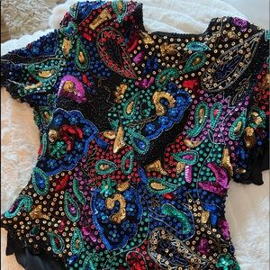 Women bundle of 2 sequins shirts. In perfect condition, dress up or down!
